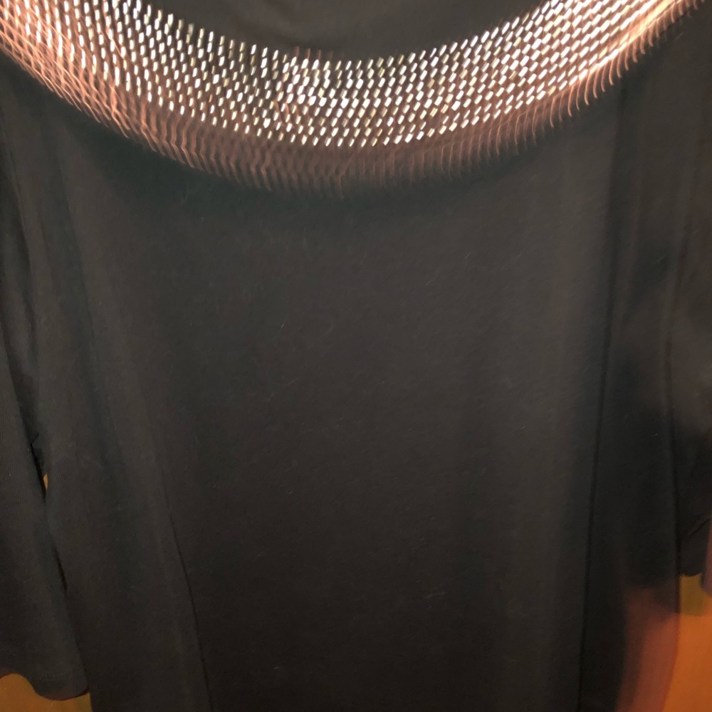 Beautiful Rafaela  black top with gold trim collar